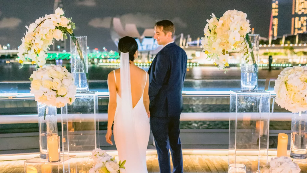 Elegant wedding setup with floral centerpieces, soft lighting, and luxury decor - Yurina Chris Wedding | Wedding Deco Singapore